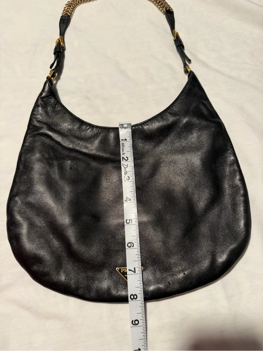 Prada Black Leather Hobo with Gold Chain Accent and dust bag .